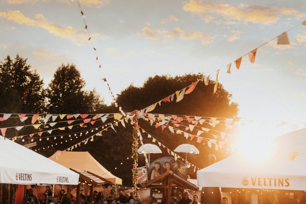 Tent top and waving colored flags at a carnival