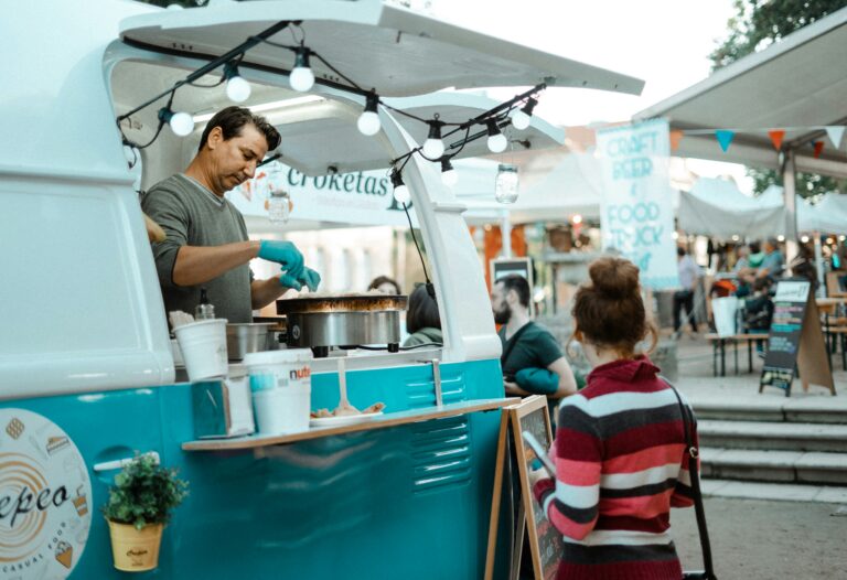 Woman placing an order at a food truck
